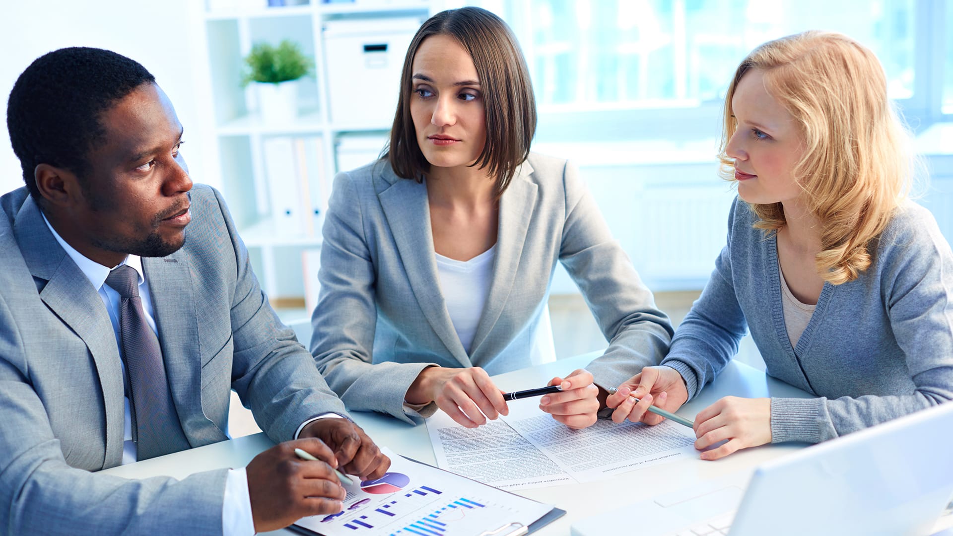 Image showing a man negotiating with his creditors.